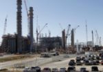 Southern’s Risky Projects are Undercutting Profits and Stock Price Workers vehicles fill parking lots at Mississippi Power’s Kemper County energy facility near DeKalb, Miss., in this 2012 photo. Delays and cost overruns at the “clean coal” plant have weighed on Southern Co.’s bottom line. (AP Photo/Rogelio V. Solis, File)